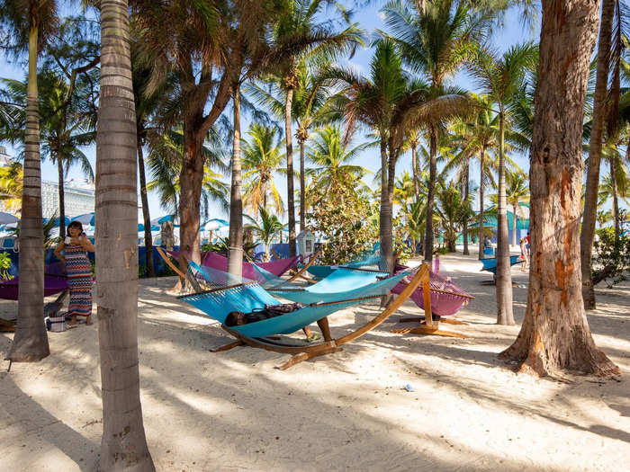 Perfect Day at CocoCay is filled with pockets of relaxation from these shady hammocks to the tree-lined walkways that snake around the island.