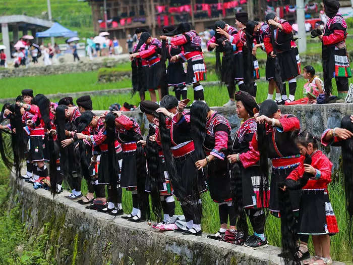 People around the world marvel at the traditional beauty of the Red Yao women and their customs. They are lauded as the "rapunzels" of their province, which has created a substantial market to present the traditions they