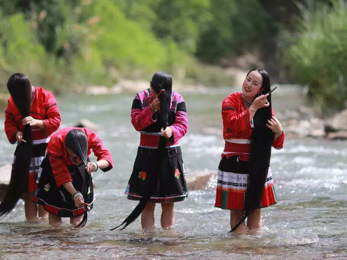 Growing their locks to nearly six feet long, the women have a traditional cleansing routine they follow to maintain hair health and color.