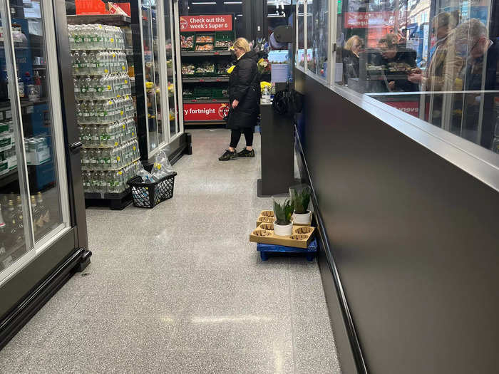 There was also a level of disorganization at the Aldi in the UK, such as these randomly placed plant pots by the checkout area.