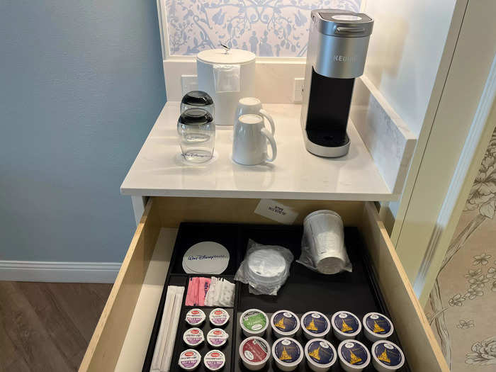 The coffee bar above the mini fridge had a Keurig machine, plus 10 coffee and tea pods.