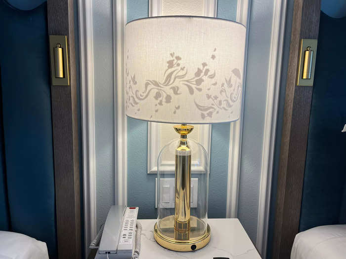 My favorite lamp was on the nightstand, and it had a "Mary Poppins"-themed shade.