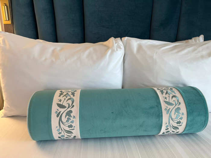 The pillows on the beds had umbrellas and penguins sewn on them to match the "Mary Poppins" theming.