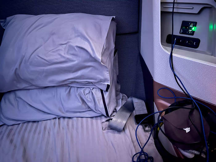 Moreover, the airline gave me two fluffy pillows, and I thought the mattress pad softened the bed. I ended up sleeping for about eight of the 18 hours from Singapore to New York.