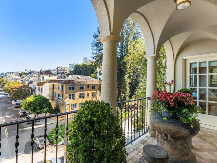 Both the primary bedroom and this bedroom lead out to a balcony that overlooks San Francisco.