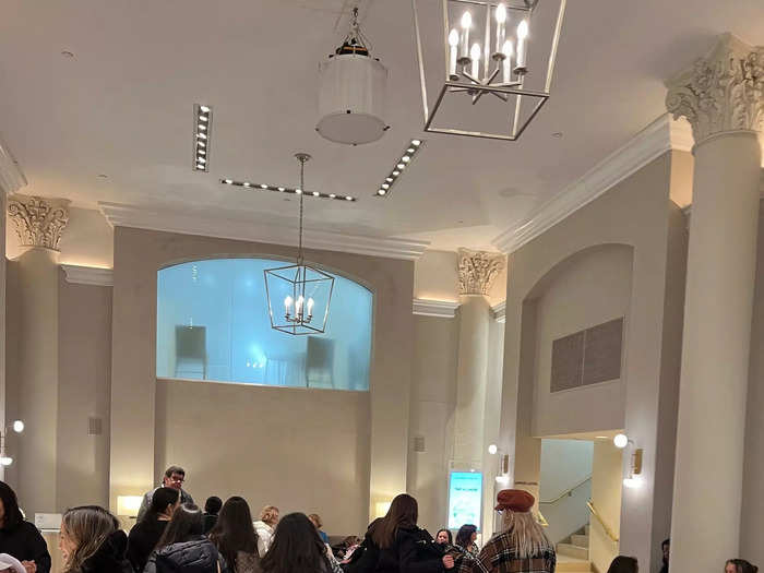 The lobby was full of brides and their loved ones waiting to find their dream dresses.