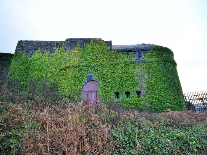 The fort is steeped in history, with the gun tracks, fireplaces, wooden framework within arched windows, and decorations on the washroom walls.