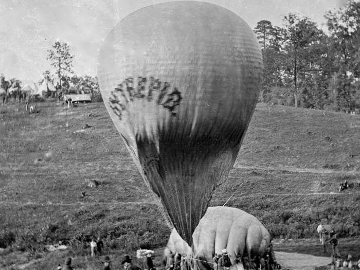 During the Civil War in the US, both sides used balloons to survey battlefields. They got as high as 1,000 feet and were usually tethered so they could be pulled back down and balloonists onboard could convey the intelligence they gathered.