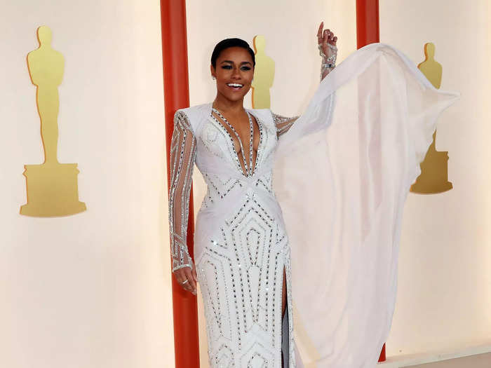 Ariana DeBose also wore a long-sleeved gown with a deep-V neckline.