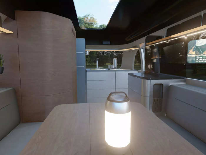 Windows and skylights brighten the small interior space. And like any travel trailer, the concept home has an exterior awning for outdoor lounging.