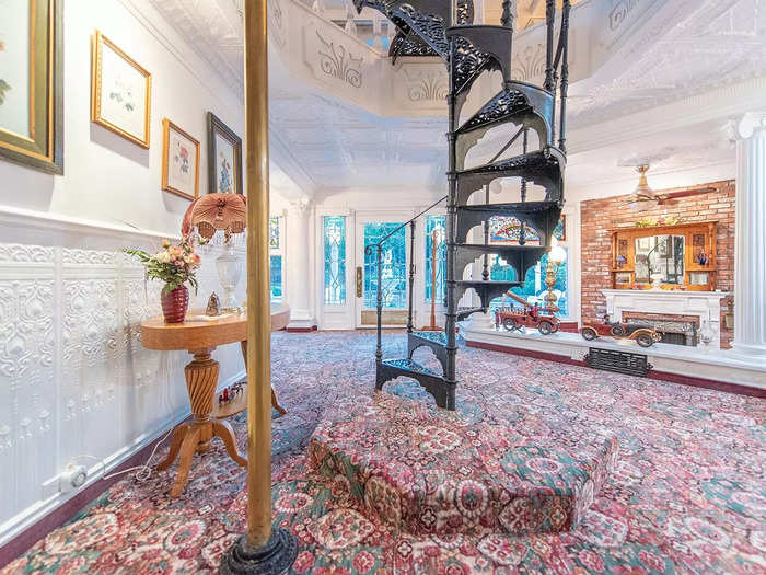 Every room that Douglas added was designed around a single item — like the spiral staircase and fireman pole that he bought at an auction in London, Olguin said.