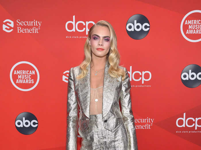 Delevingne shined bright at the 2020 American Music Awards, wearing a metallic silver suit with a nude corset.