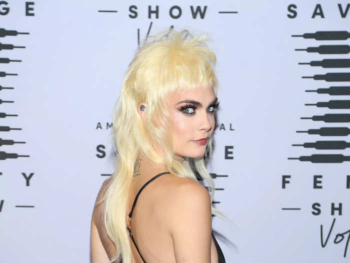 At the October 2020 Savage X Fenty show, Delevingne debuted a platinum-blonde mullet, which she paired with a backless jumpsuit.