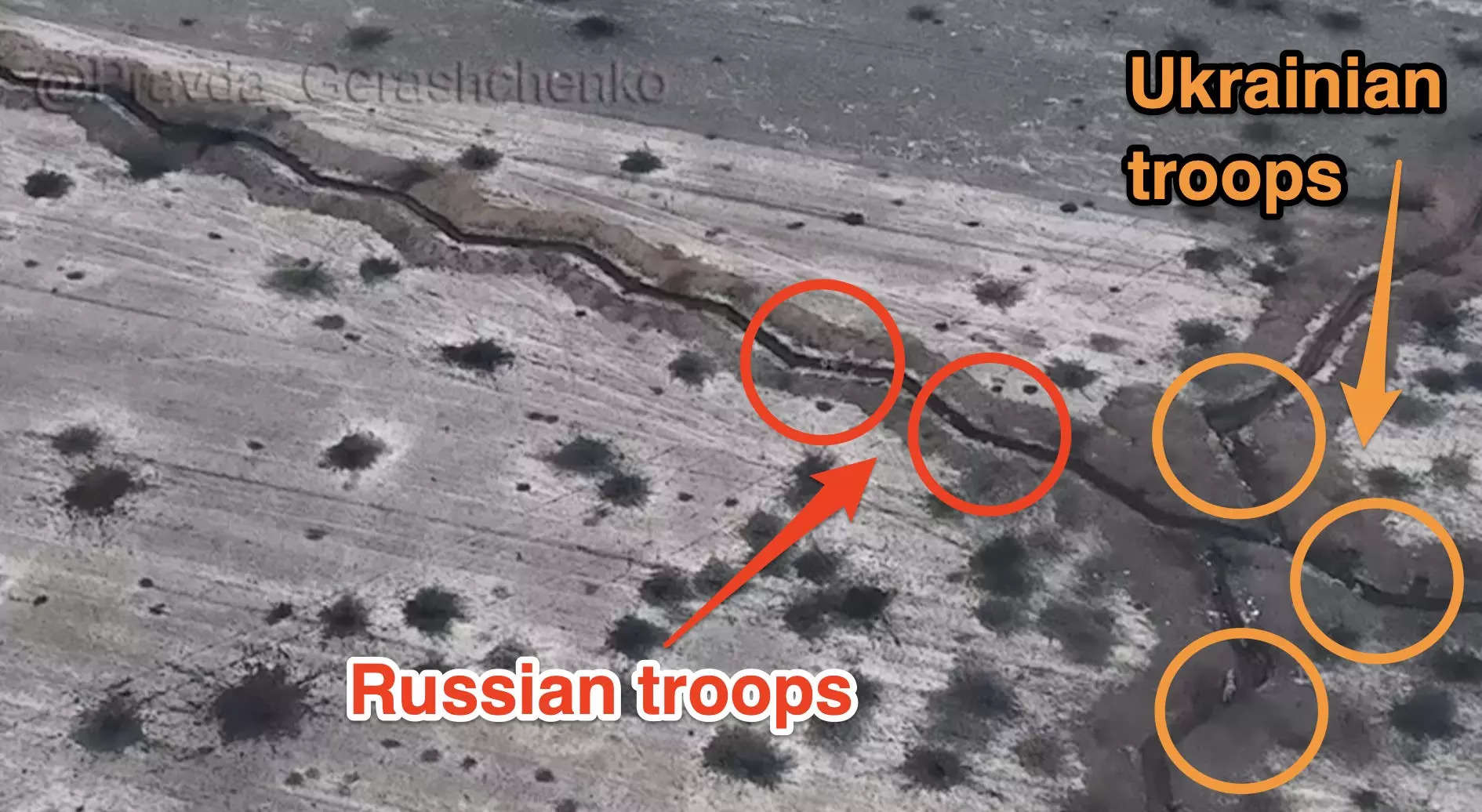 A screenshot of an aerial view of the trenches, showing allegedly Russian and Ukrainian troops moving towards each other.