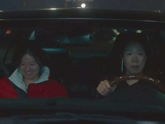 Sun-a plays a K-pop track while driving with her mother Hyeon-nam.