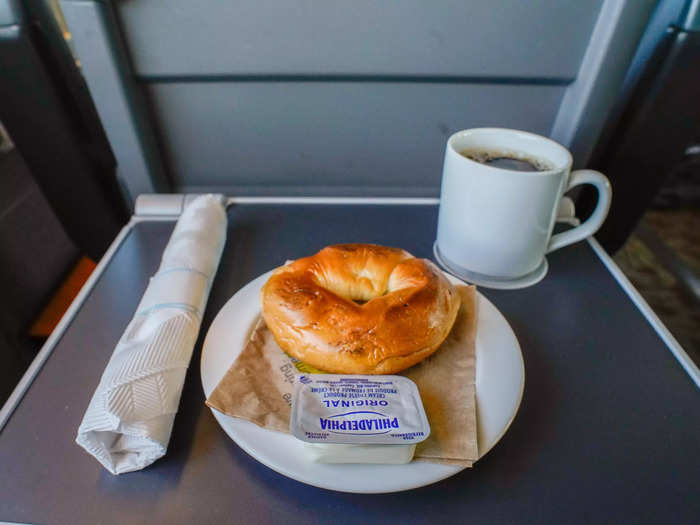 Shortly after departing, a train attendant came around with complimentary drinks and breakfast: a warm bagel with cream cheese. It was no New York bagel, I thought, but it was decent and filled me up.