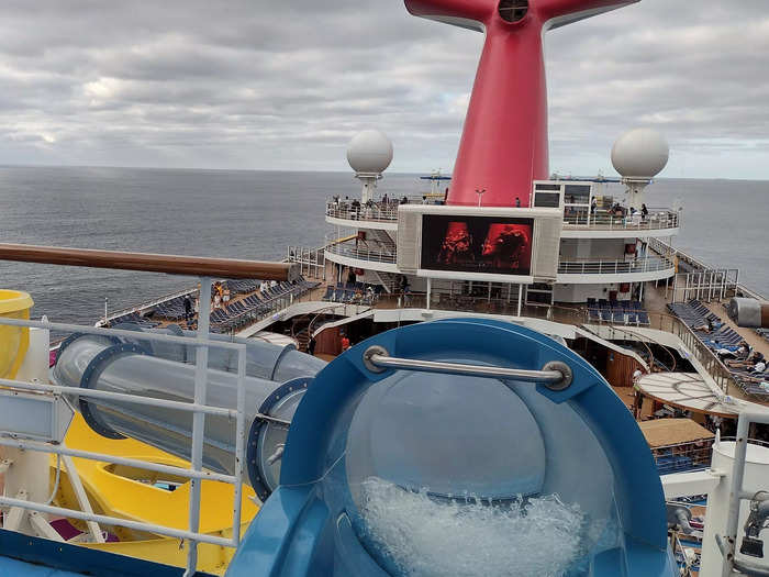 Near the main pool, Carnival Radiance waterslides are open to all ages with two large slides and one for little kids.