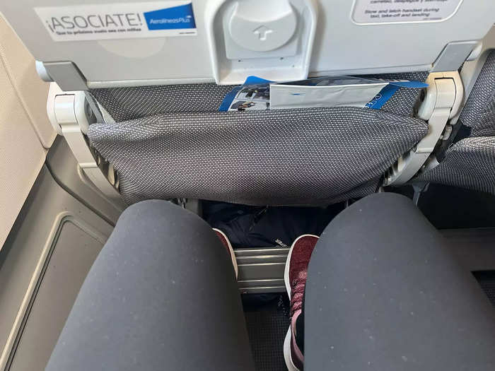 I watched a movie before falling asleep for about four hours. While I can normally sleep on planes as long as there is a headrest, the footrest made the journey even more comfortable.