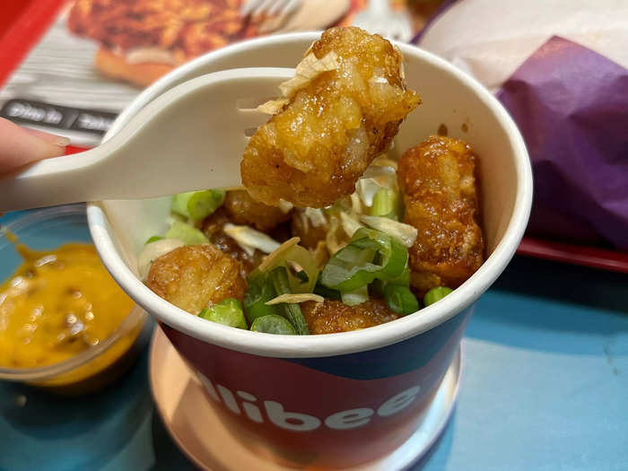 The tater tots were tossed in hot honey and caramel. Rushen said the sweet flavors from the honey were a homage to the Philippines, where sweet flavors are often used in cooking.