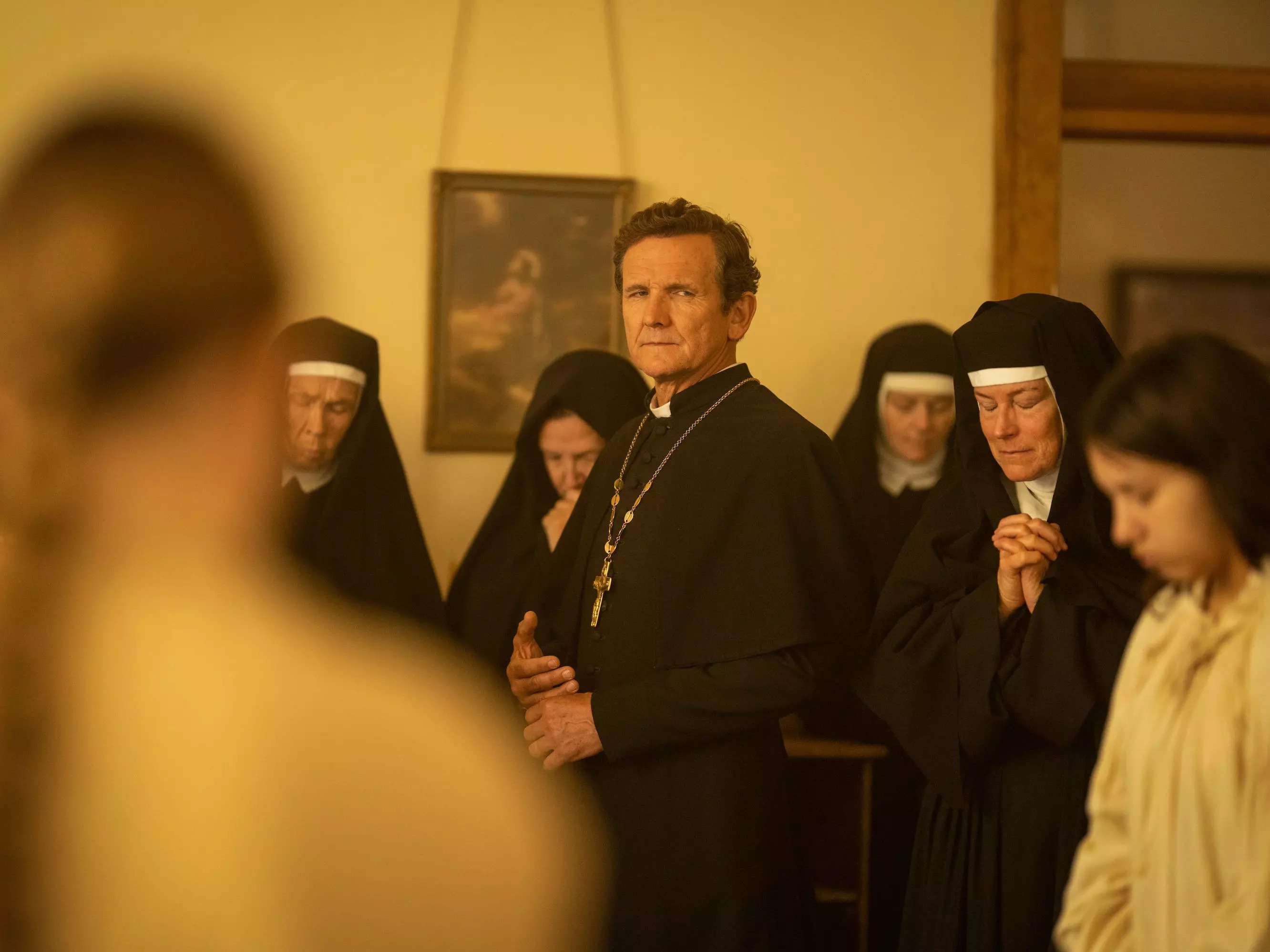 Sebastian Roché as Father Renaud of the Paramount+ series "1923."