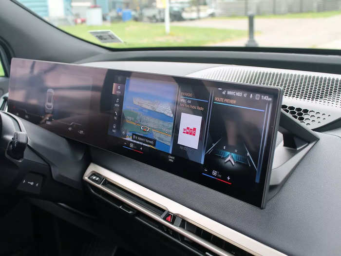 It came with two crisp screens stylishly suspended above the dashboard on a single, curved panel.