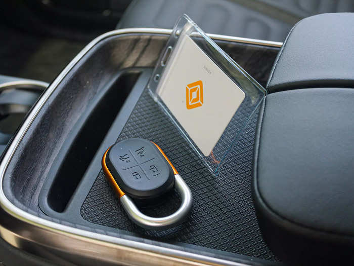 Owners can unlock and drive their Rivians using a smartphone app, a key card, a carabiner-style fob, or a waterproof rubber bracelet (for taking along on outdoor adventures.)