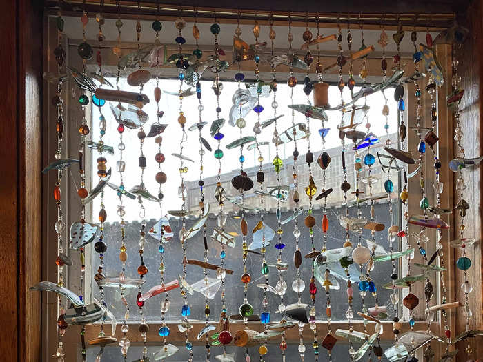 MacKenzie turned broken pieces of glass into a dangling piece of art that hangs on one of the kitchen