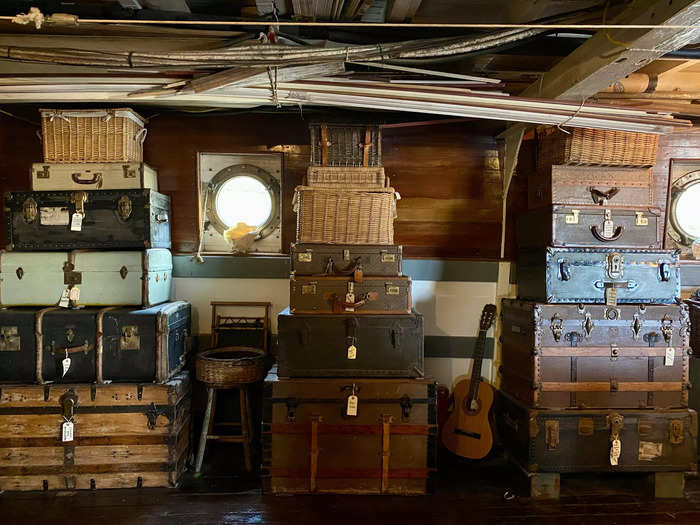 The suitcases on the cargo deck, which the couple uses for storage, resemble the ones immigrants brought to Ellis Island.