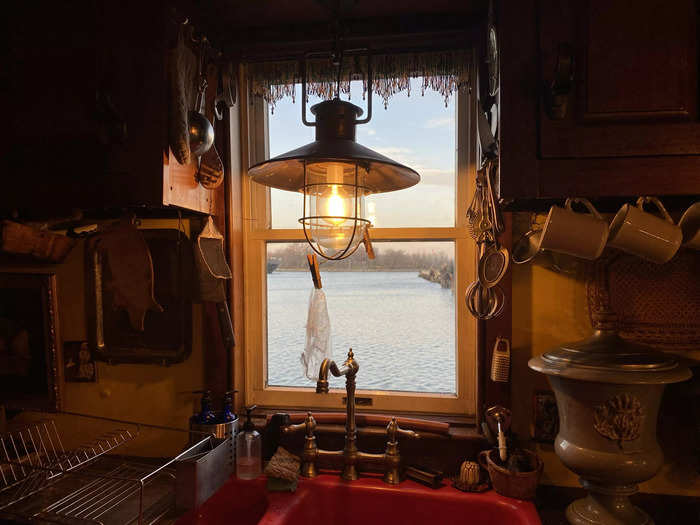 Passengers can see views of the calm water from the kitchen sink.