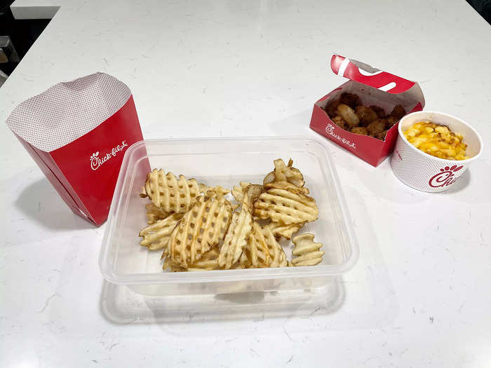 First, add the waffle fries.