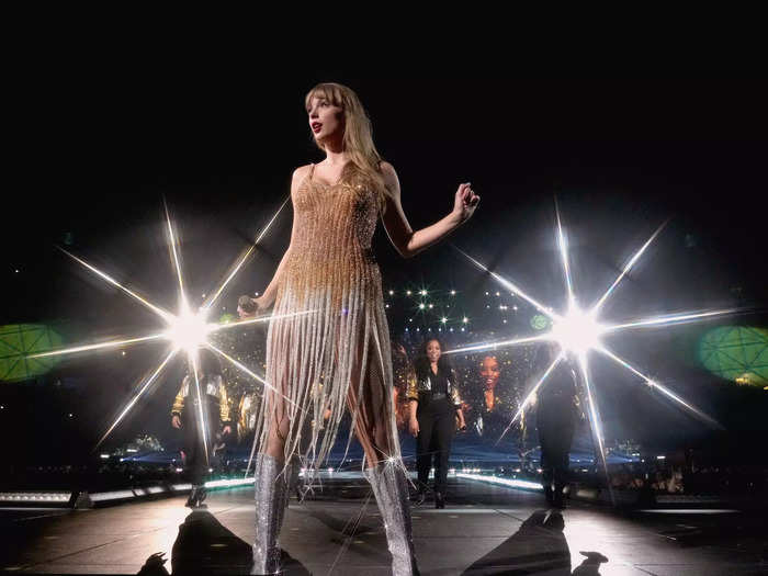 Swift wore a different gold Roberto Cavalli dress for her performances of "Fearless" songs on her second night in Glendale, Arizona.