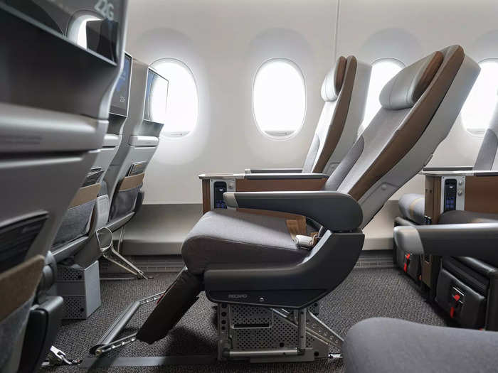 …while premium economy is in a 2x4x2 layout with added amenities, like a footrest, a legrest, and 40 inches of pitch. The screen is also larger at 15.6 inches.