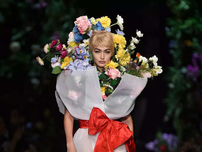 Scott transformed models into flower bouquets for his next runway show with Moschino.