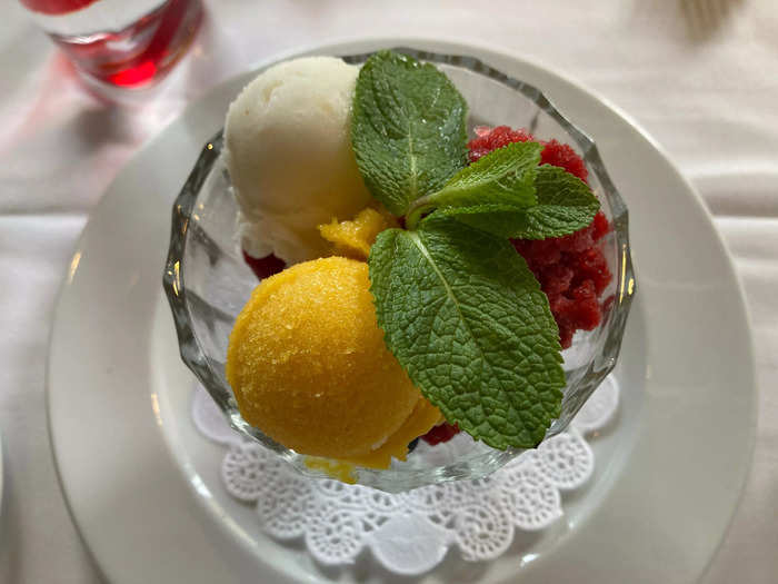 I chose a $16 trio of mango, raspberry, and lemon sorbets with fresh berries from the dessert menu.