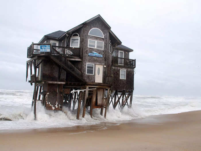 This is a home named "Wave Breaker" being pummeled by waves in 2014.