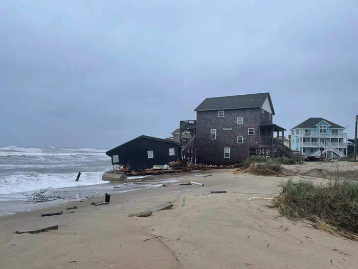 Local photographer Michael Halminski told Yale Environment 360 an estimated 50 homes had collapsed into the sea since the 1970s.