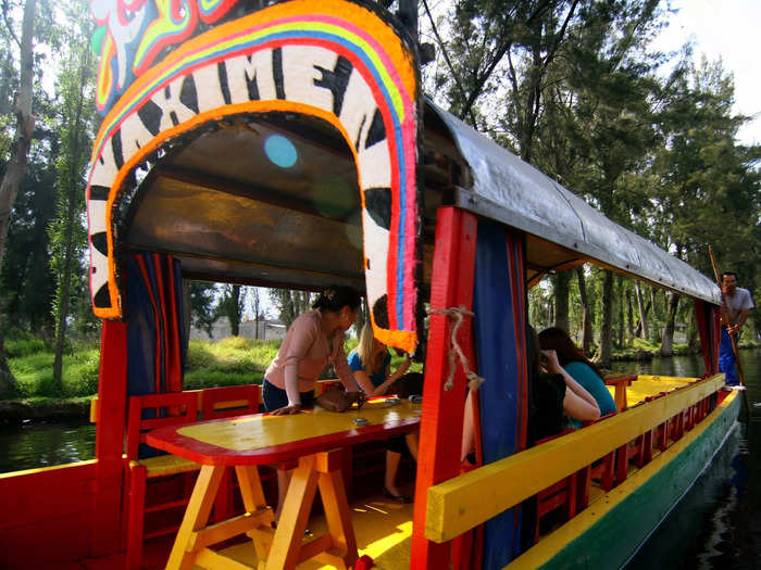 Take a boat tour of the Xochimilco canals.