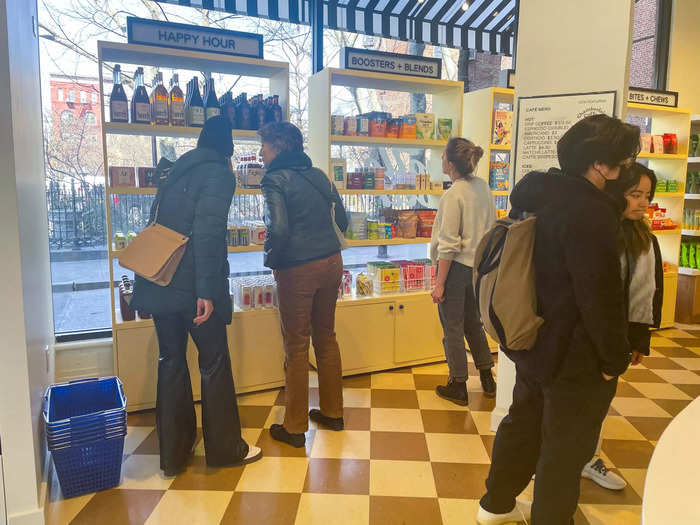 Following the curve of the wall, I found myself standing in front of more seemingly niche sections of elixirs, health-boosters, cereal, and "bites + chews."