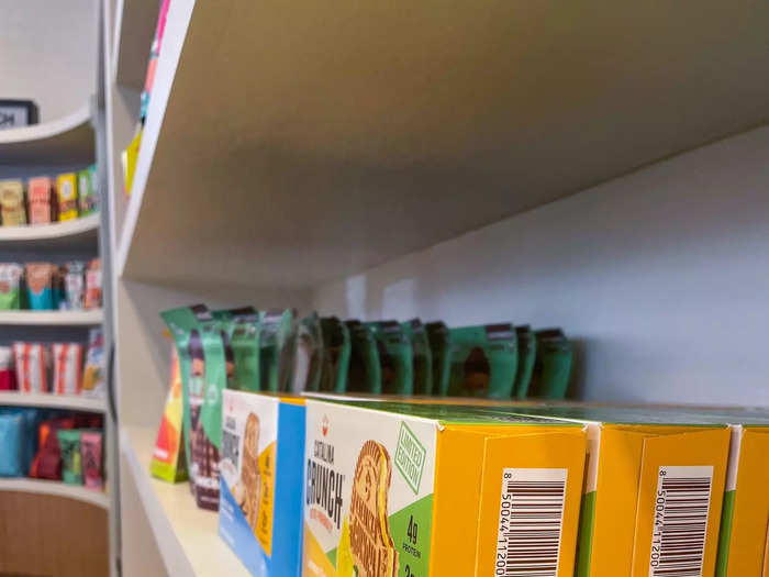 On the other side of the restroom were more shelves that carried some pantry desserts and sweets.