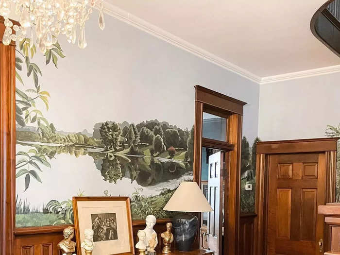 While the Millers repainted most of the home, they decided to keep a hand-painted mural in the entryway.