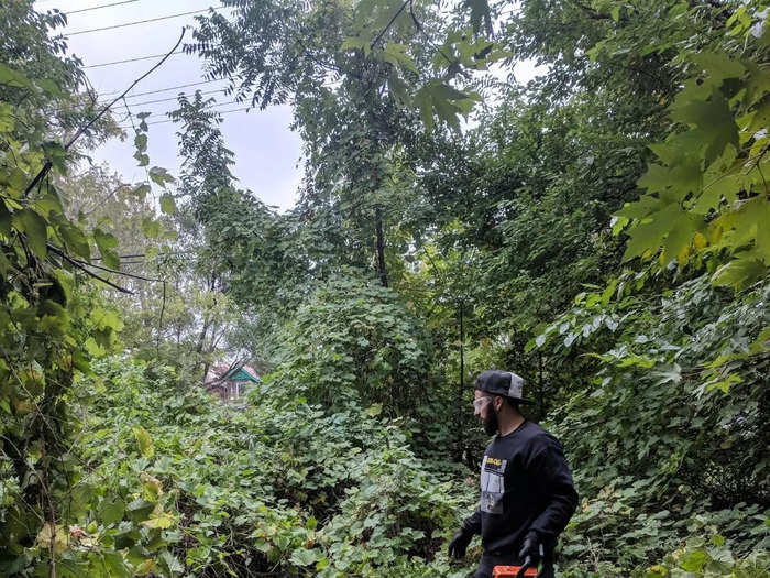 As the home had been abandoned for many years, its yard had grown wild with vegetation.