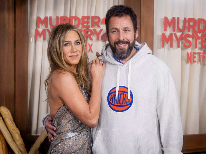 Jennifer Aniston roasted Adam Sandler for wearing a sweatshirt to the