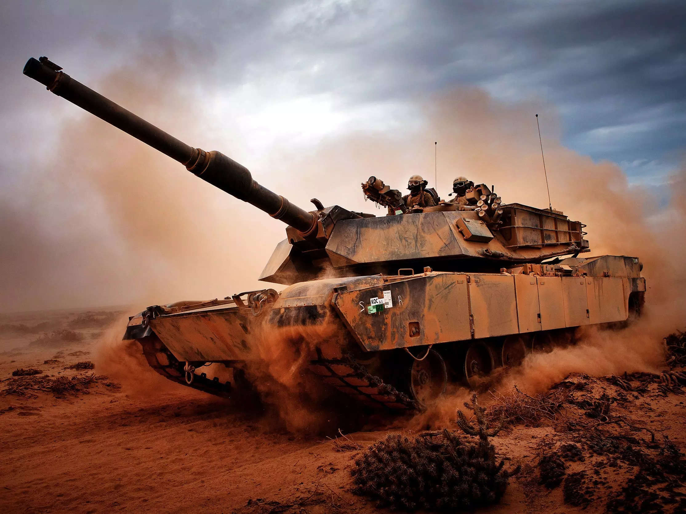 Marines from 4th Tank Division, Twentynine Palms, Calif., roll down a dirt road on their M1A1 Abrams Main Battle Tank during a day of training at Exercise Africa Lion 2012, April 13, 2012.
