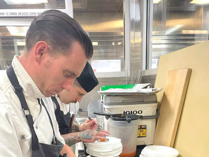 I spotted the chocolate bars I had helped mold just hours before, and watched as Aitchison transformed the sashimi I sliced into a stunning rose.