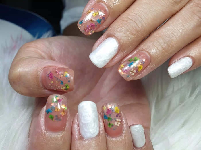 Dried-flower nails are a striking new trend.