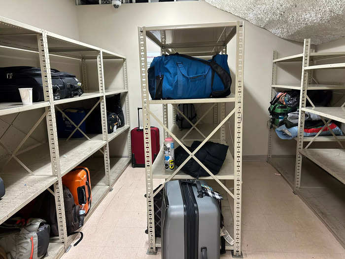 I dropped off my luggage in a large closet filled with other people