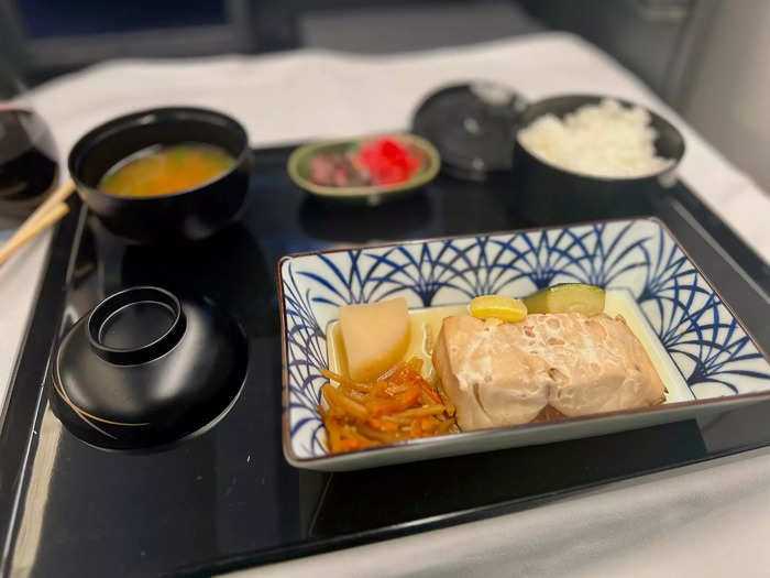 The main course came next, which was grilled fish, rice, and miso soup. As expected, the food was amazing and easily on par with competitors like Singapore Airlines.