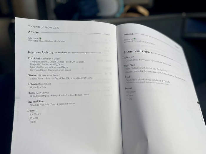 Shortly after takeoff, the cabin crew started the first meal service. ANA has a diverse menu with both Japanese and international food, like sashimi, miso soup, beef fillet, and roasted halibut.