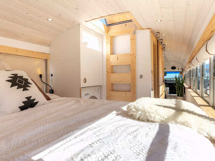 A ladder in the bedroom leads up to a roof deck.