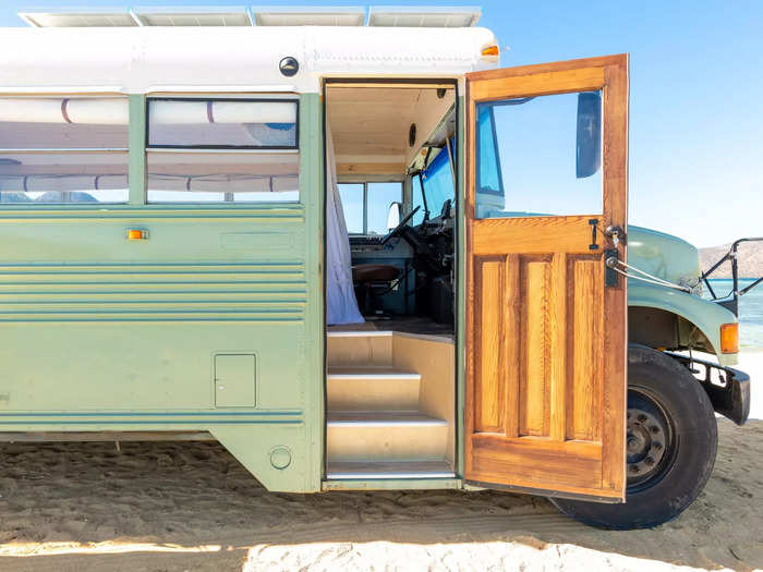 Environmental educator Tanya Nestoruk and photographer Arya Touserkani converted a school bus into a tiny house on wheels, complete with a bedroom, a bathroom, a kitchen, and a roof deck. They now live in it while traveling throughout the US, Canada, and Mexico.